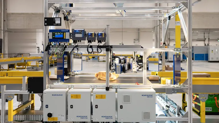 Amazon reveals new warehouse robots in push to trim manual tasks